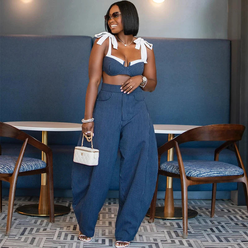 Conjunto elegante de hombro descubierto y pantalón ancho para mujer — Verano 2026